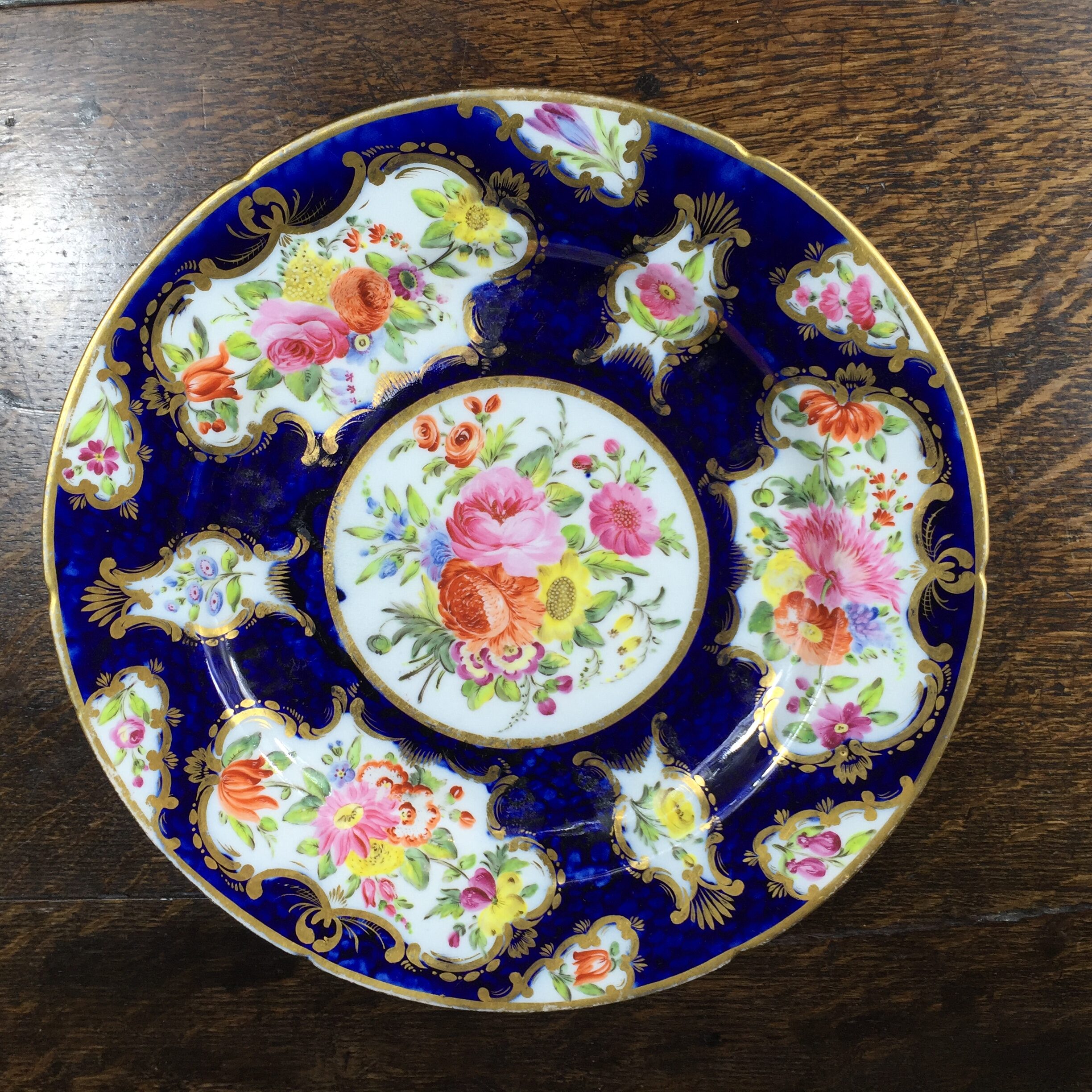 Coalport blue ground plate, superb flower panels, c. 1815 -0