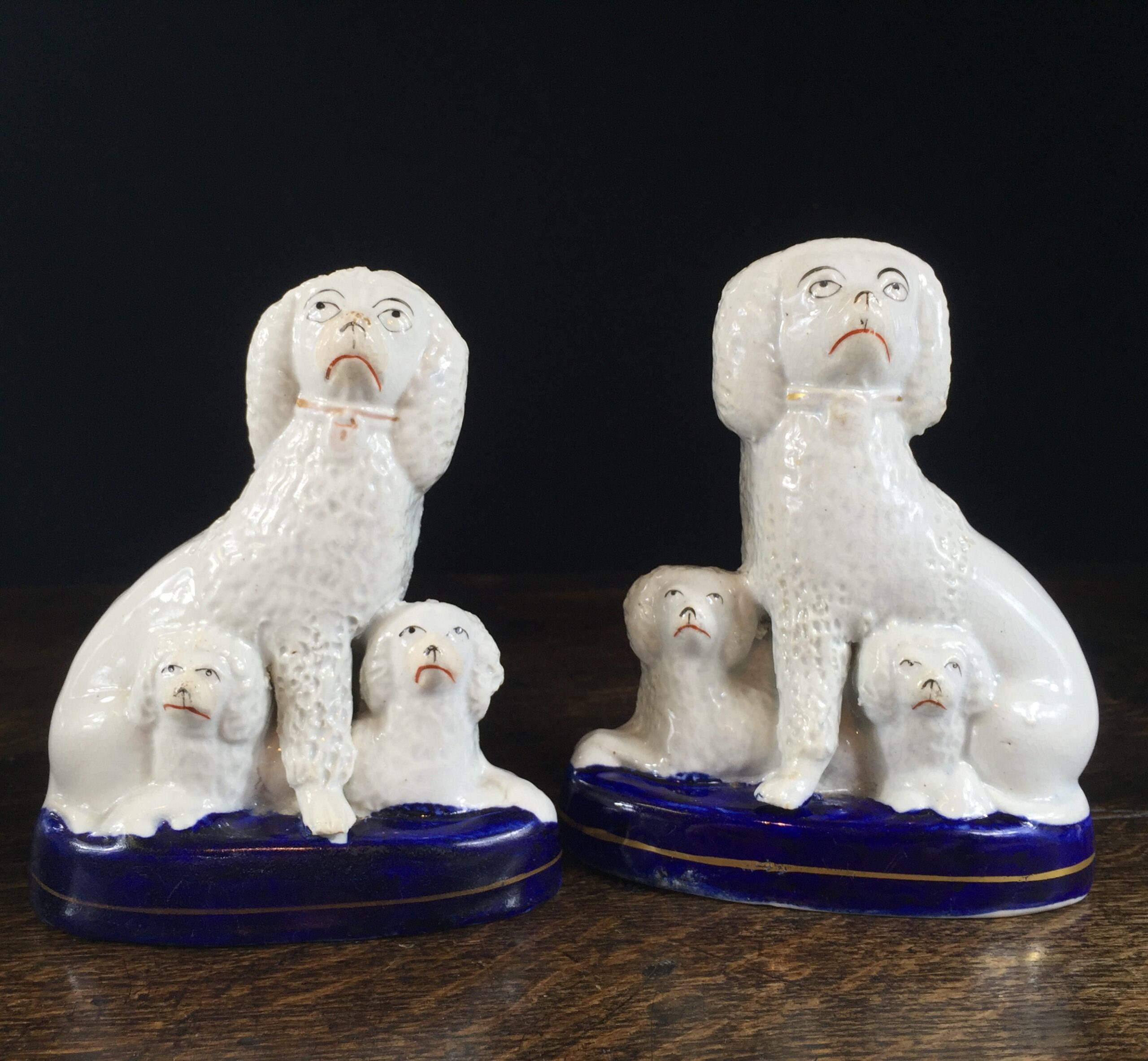 Pair of Staffordshire spaniel family groups, circa 1870 -0