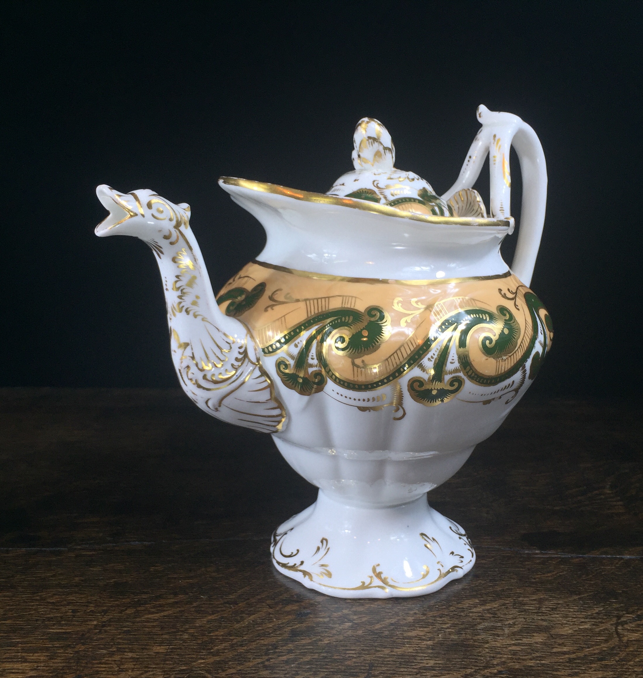 tea kettle with bird on spout
