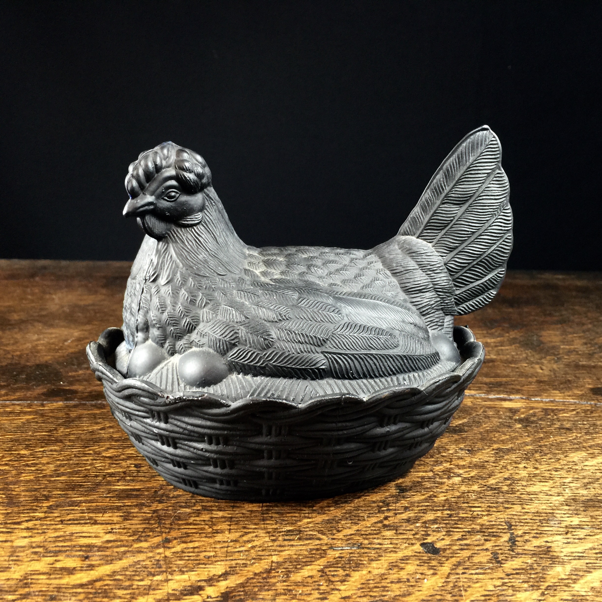 Pressed glass hen on nest, in unusual black tone, c. 1900-0