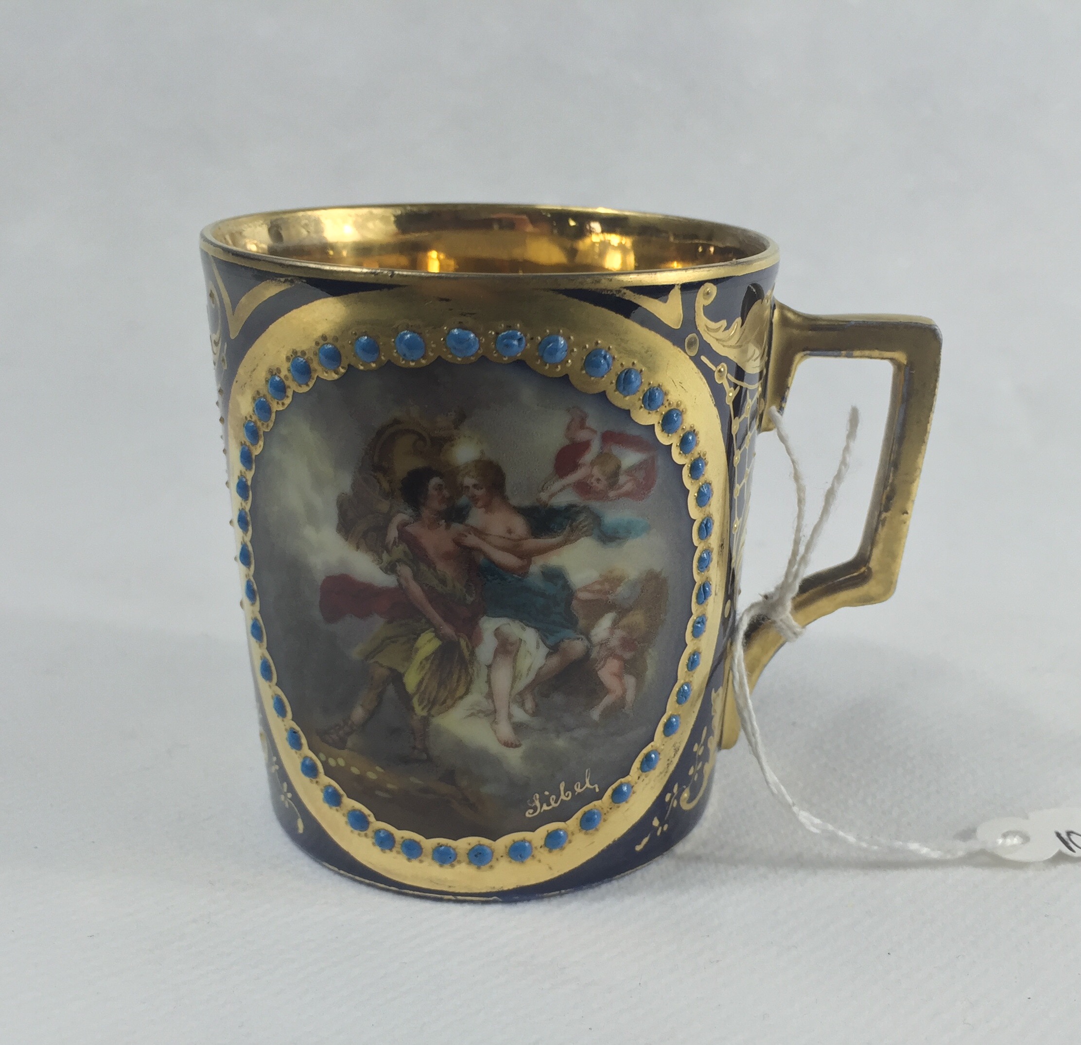 Continental porcelain coffee can, classical scene signed Siebel, c. 1910-0