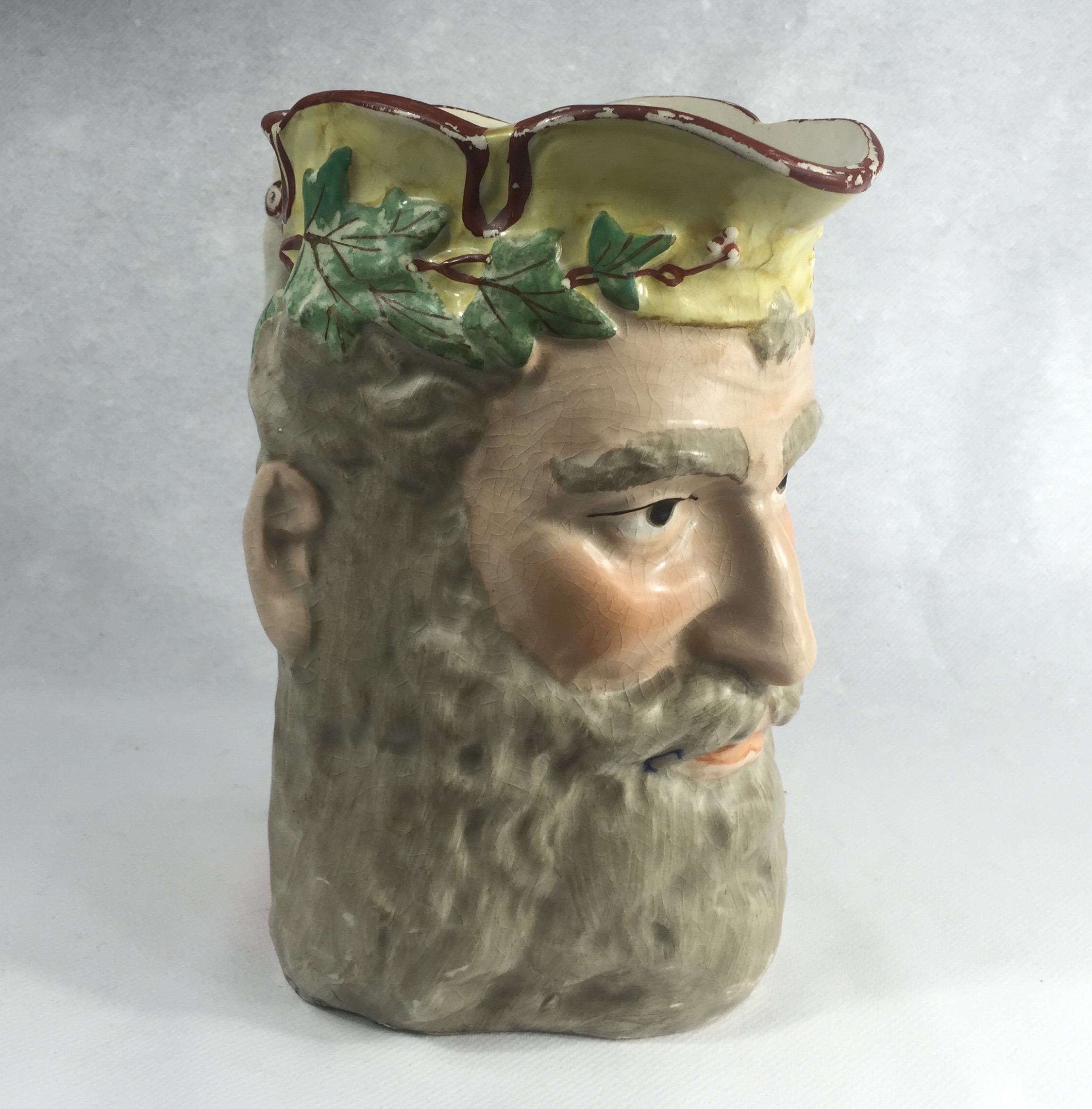 Staffordshire pottery jug, head of Bacchus, c. 1870-0