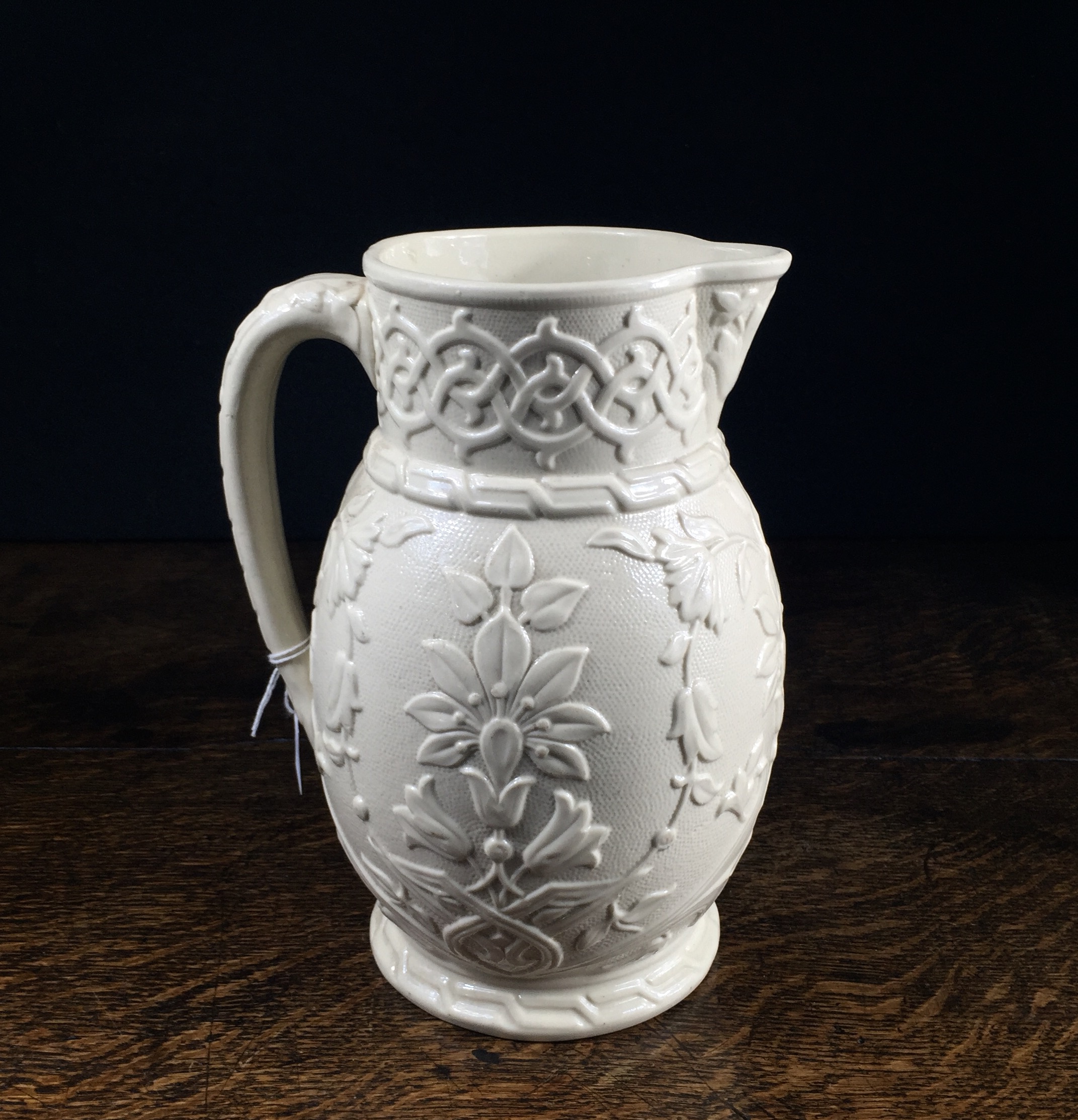 Victorian moulded white stoneware jug, strapwork, c. 1870-0