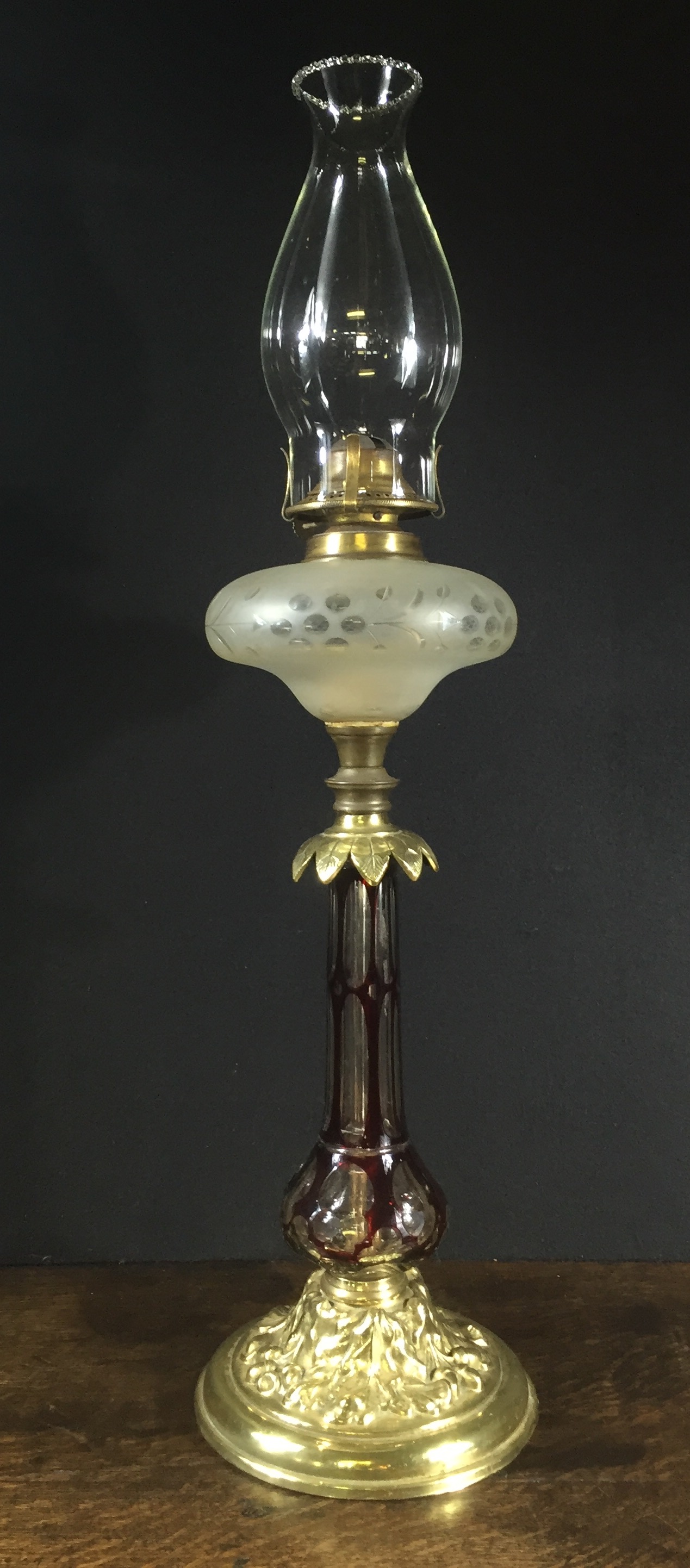 Victorian ruby glass overlay kerosene lamp on brass base. c.1870 ...