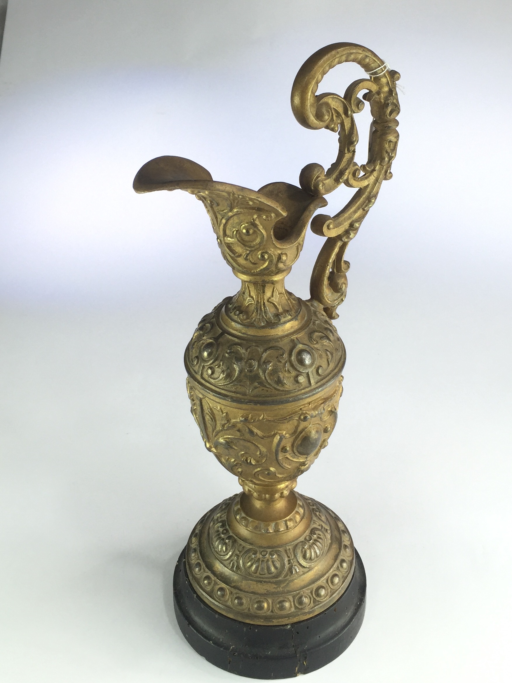 Small Victorian ormolu style ewer on wooden base, c. 1890-0