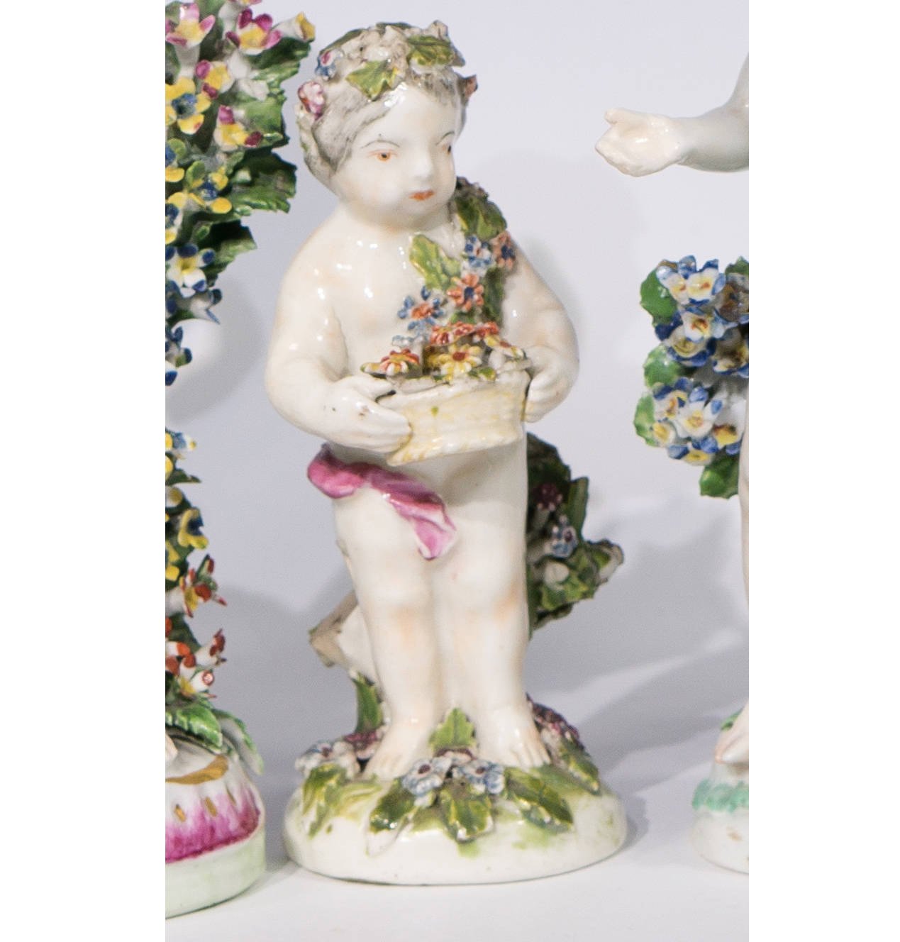 Derby figure of a cherub with flower basket, C. 1770-0