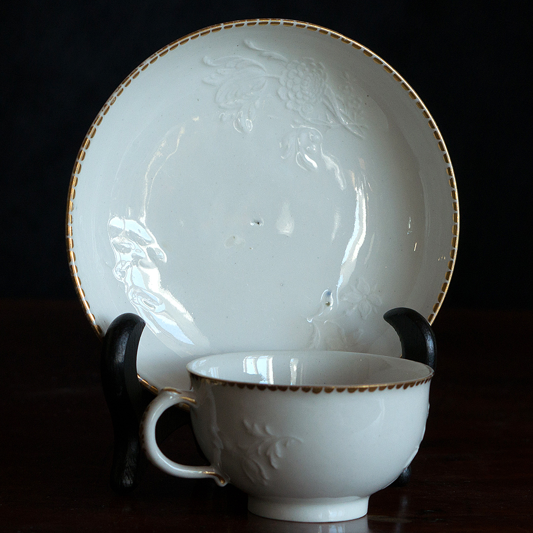 Zurich (Switzerland) porcelain cup & saucer with finely moulded flowers, c. 1770-0