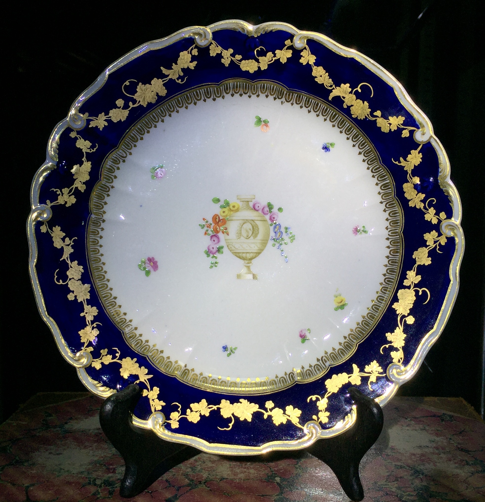 Chelsea-Derby plate, mazarine blue ground & classical urn, c.1775-0