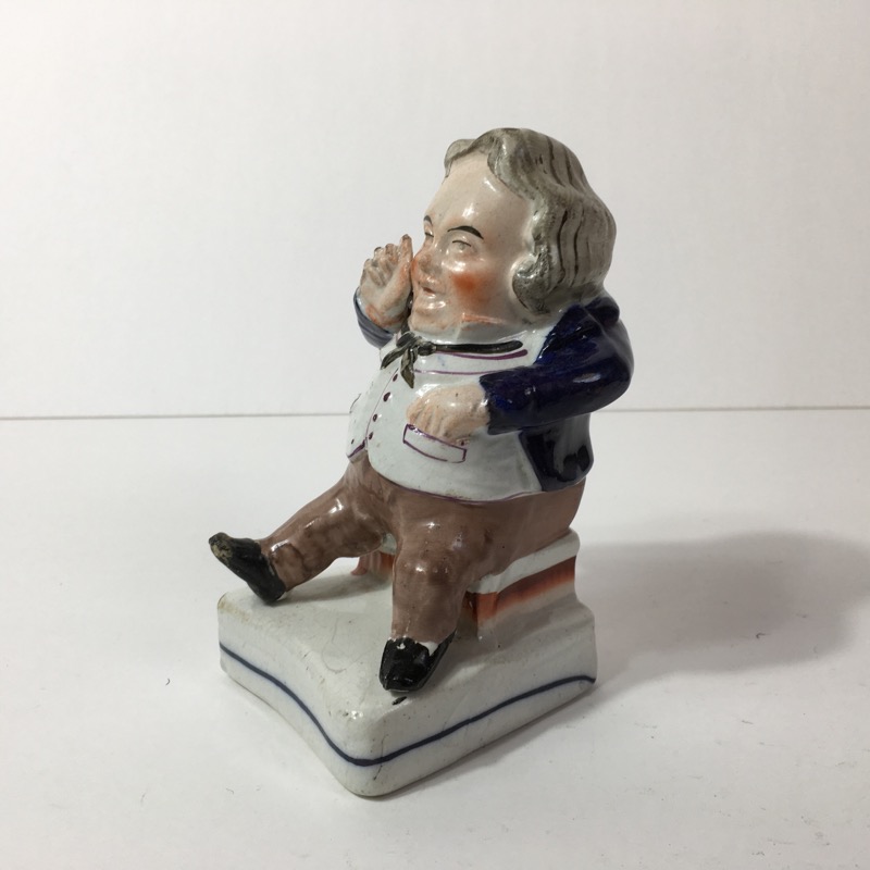 Staffordshire figure of a squat man, c. 1860-0