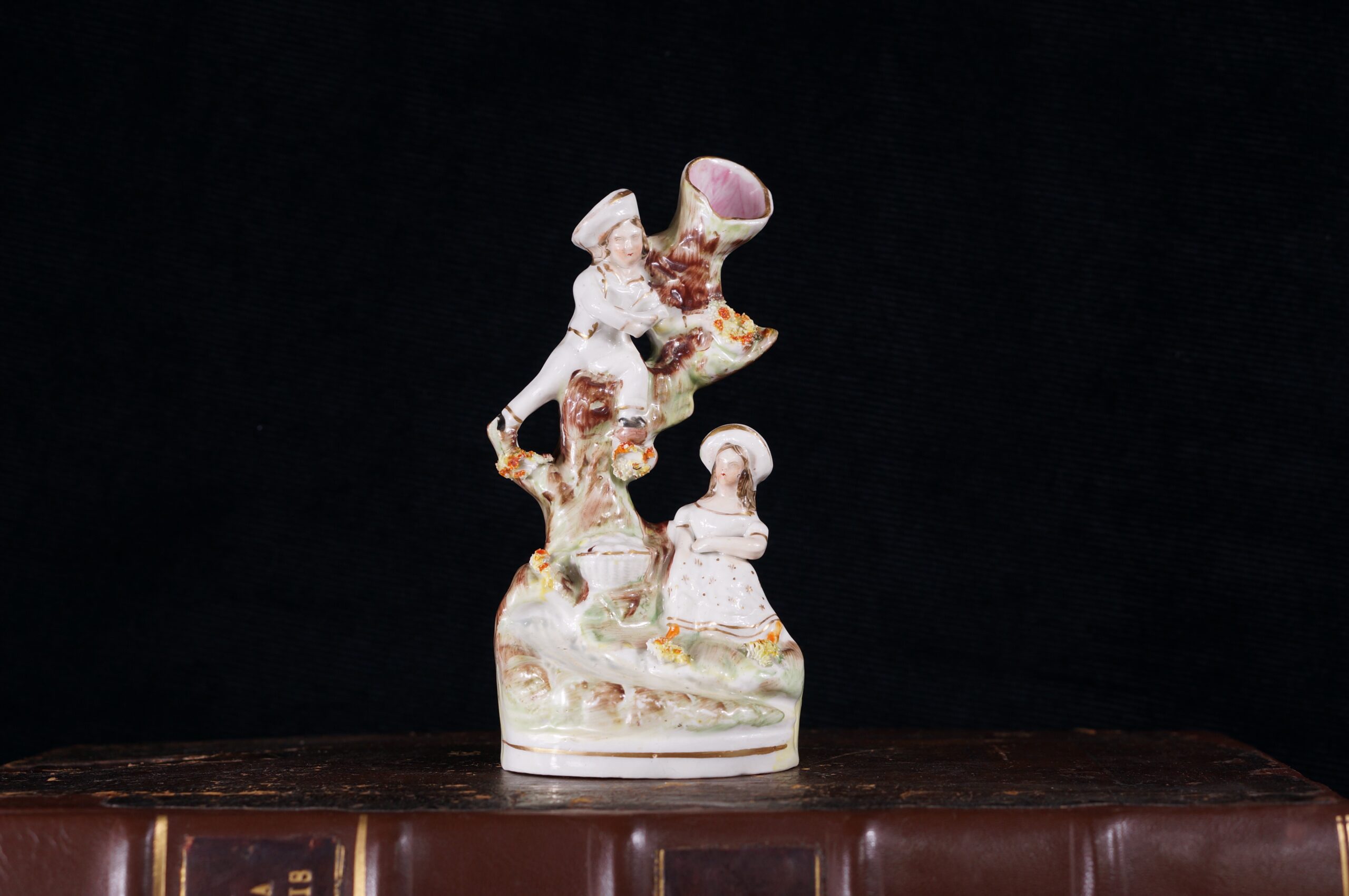 Staffordshire pottery figural spill vase, birdnesters, c.1860-0