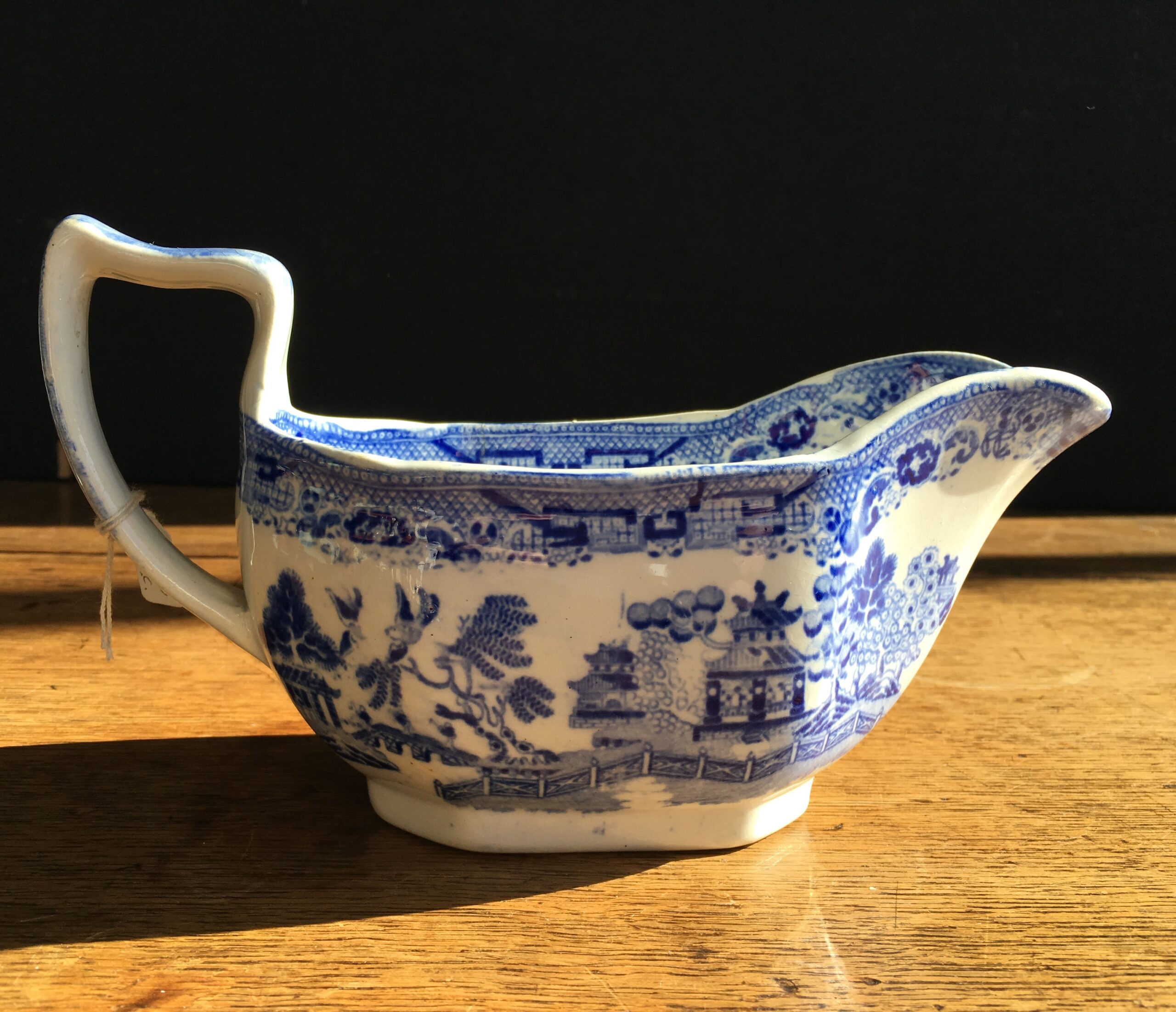 Willow pattern sauce boat, Staffordshire Pottery circa 1850-0