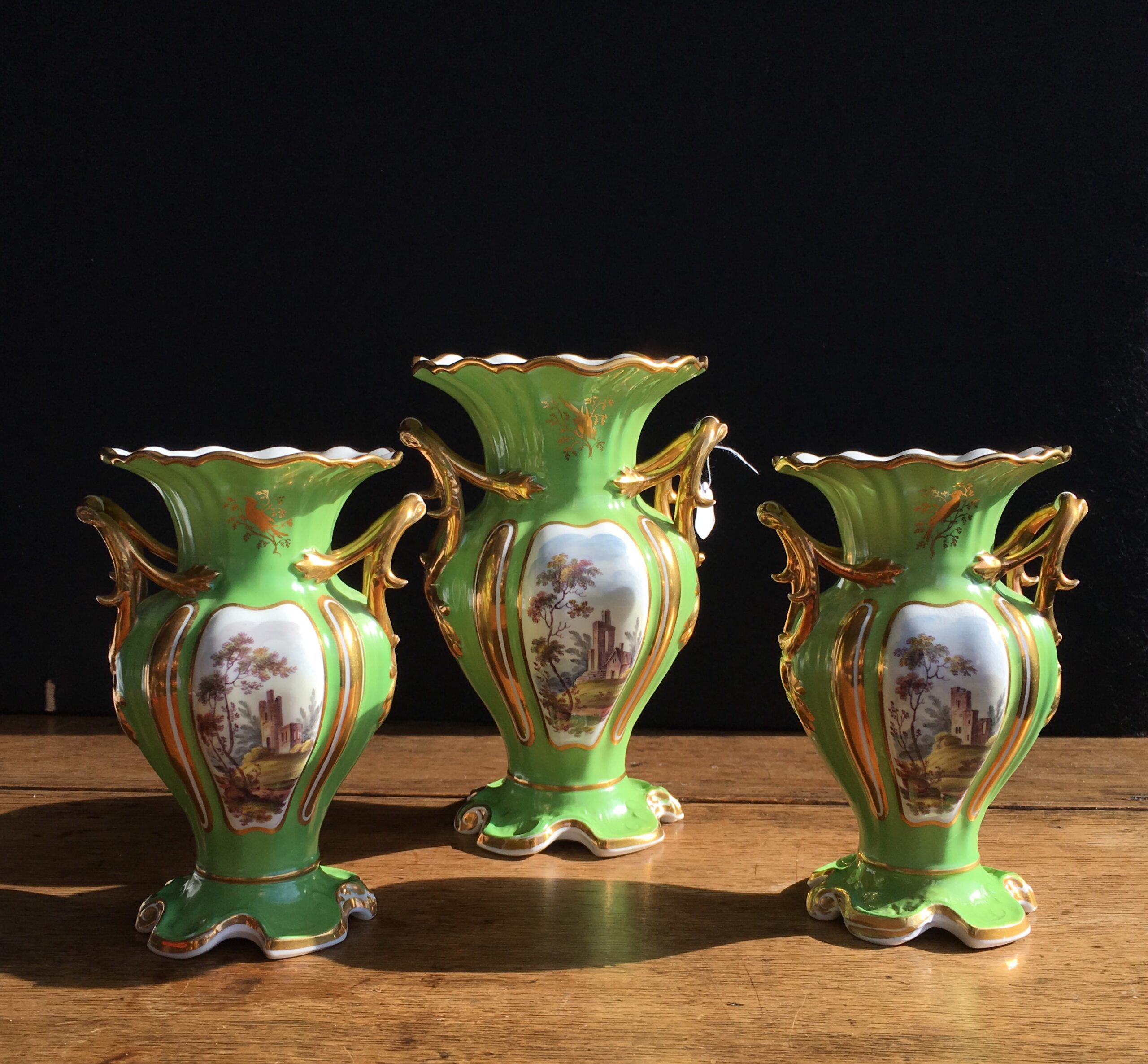 Garniture of Daniels vases, rococo with scenes, green ground, c.1830-0