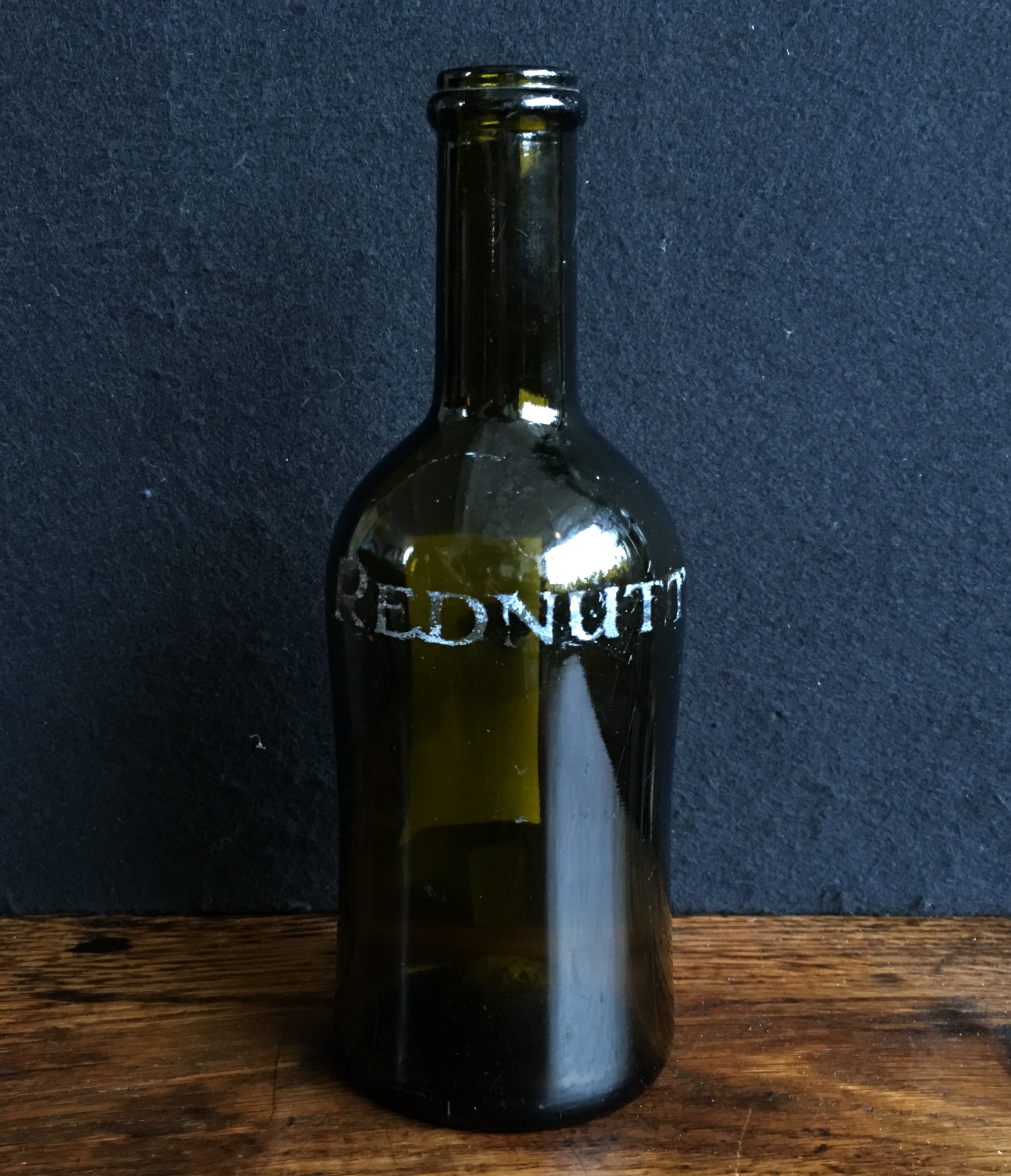 Green glass bottle with engraved label “Rednutt” , early 19th century-0