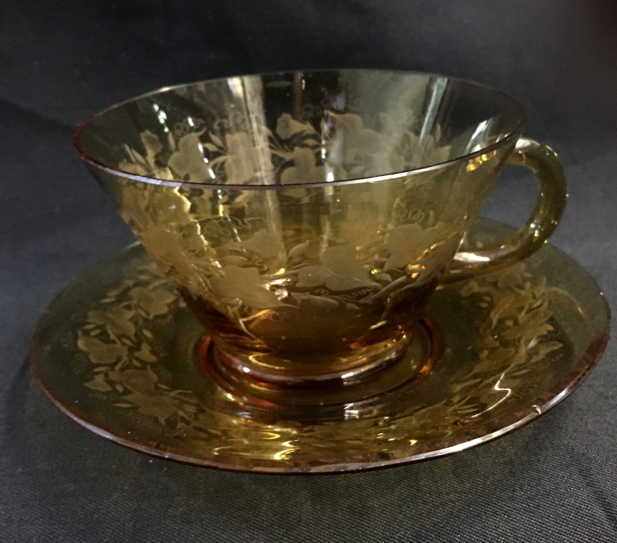 Biedermeier amber glass cup & saucer finely engraved with convolvulus, c. 1875-0