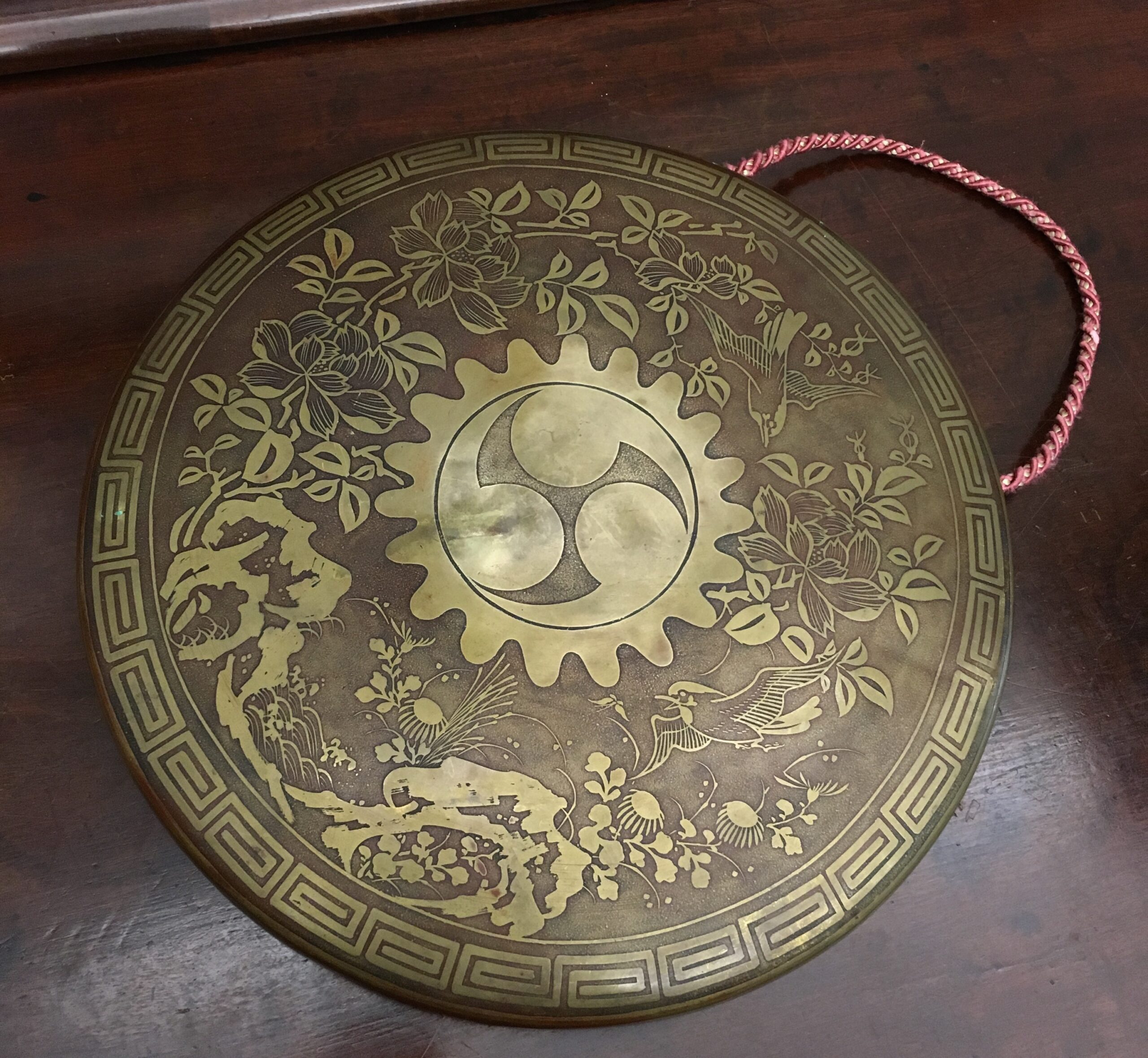 Oriental brass dinner gong decorated with birds and foliage, 19th Century -0