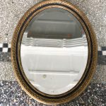 Gilt wood oval bevelled mirror, c. 1800-0