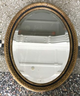 Gilt wood oval bevelled mirror, c. 1800-0