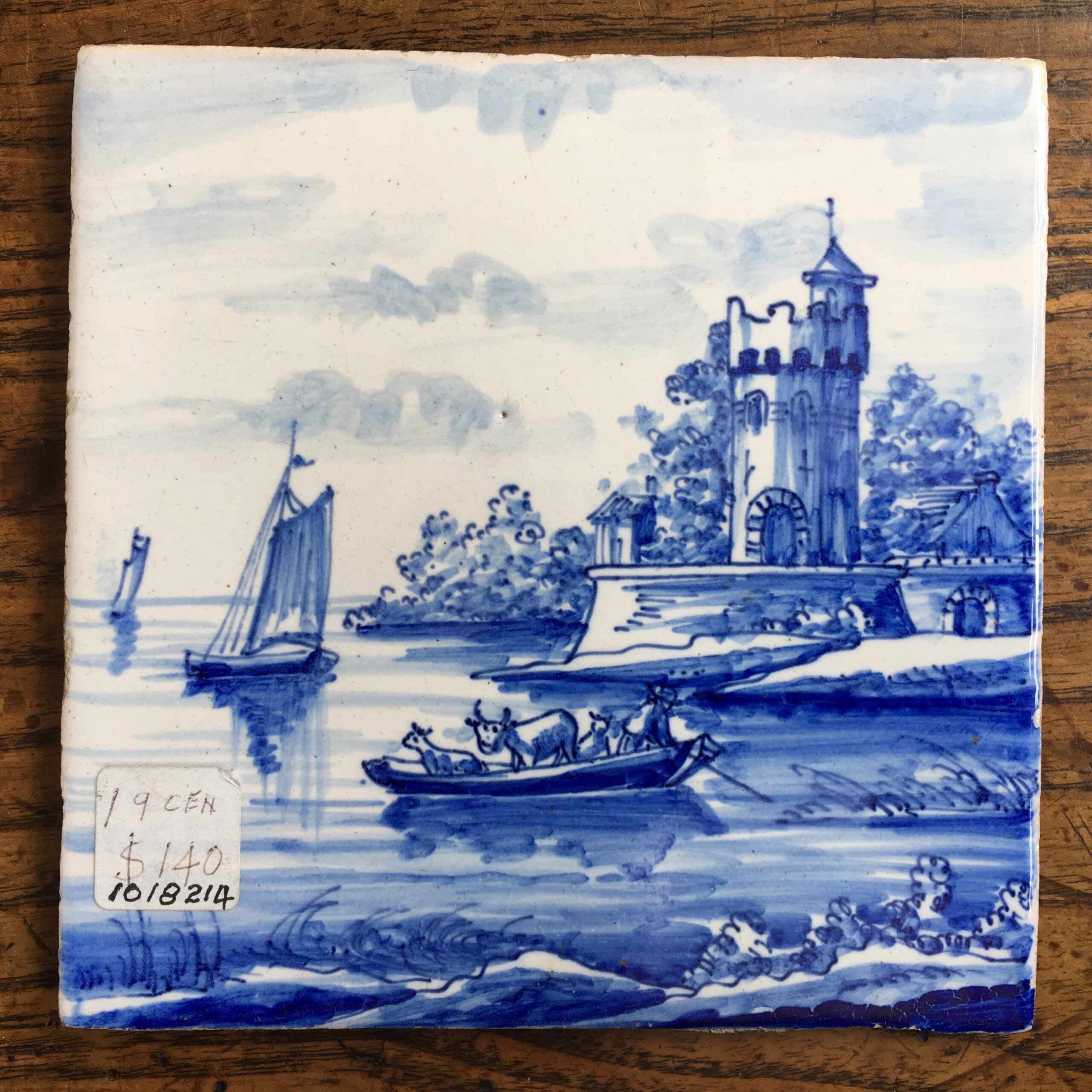 Dutch Delft Tinglaze blue & white tile, coastal scene, circa 1900.-0