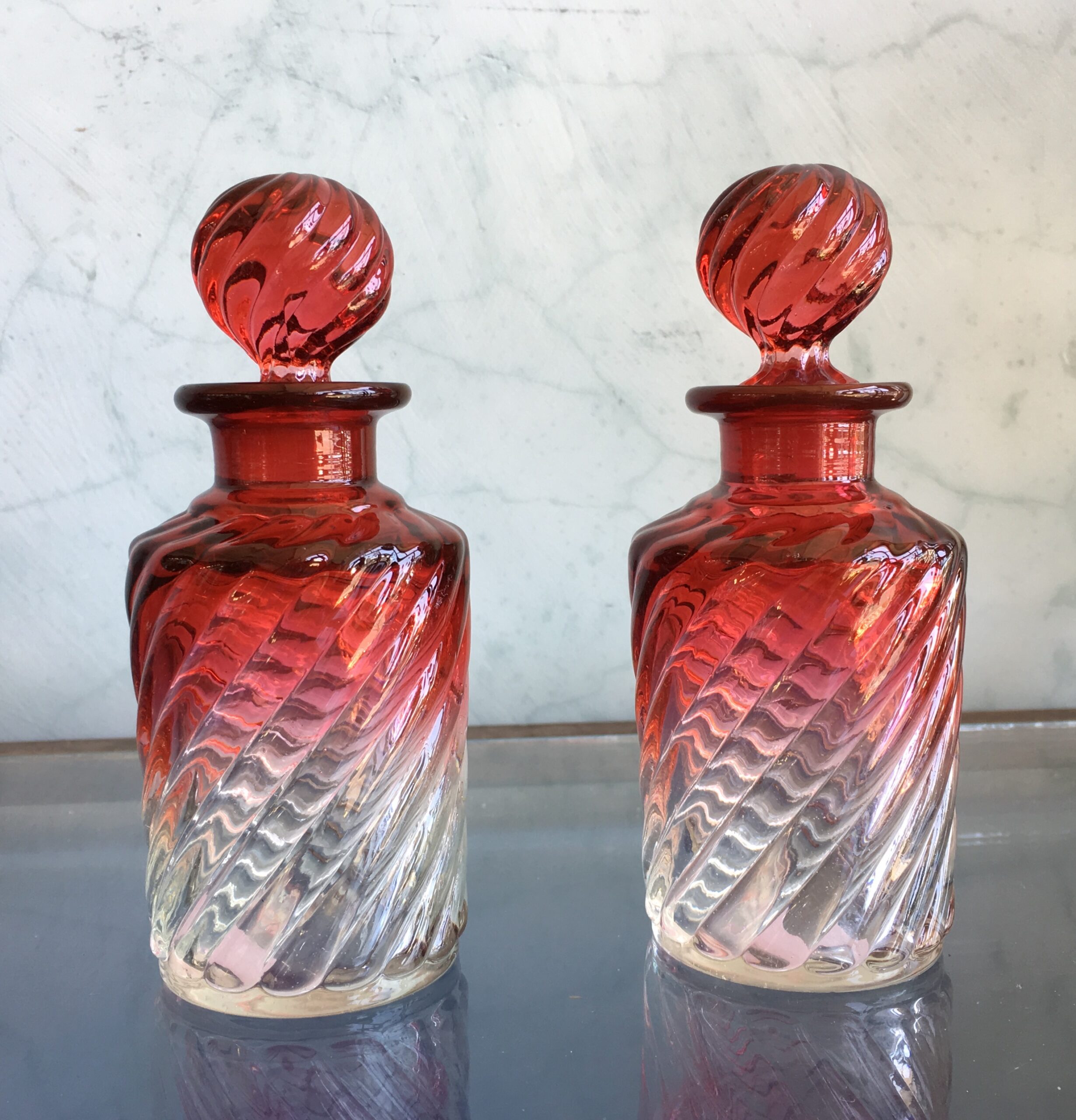 Pair of Baccarat scent decanters, spiral ruby flash, c.1880-0