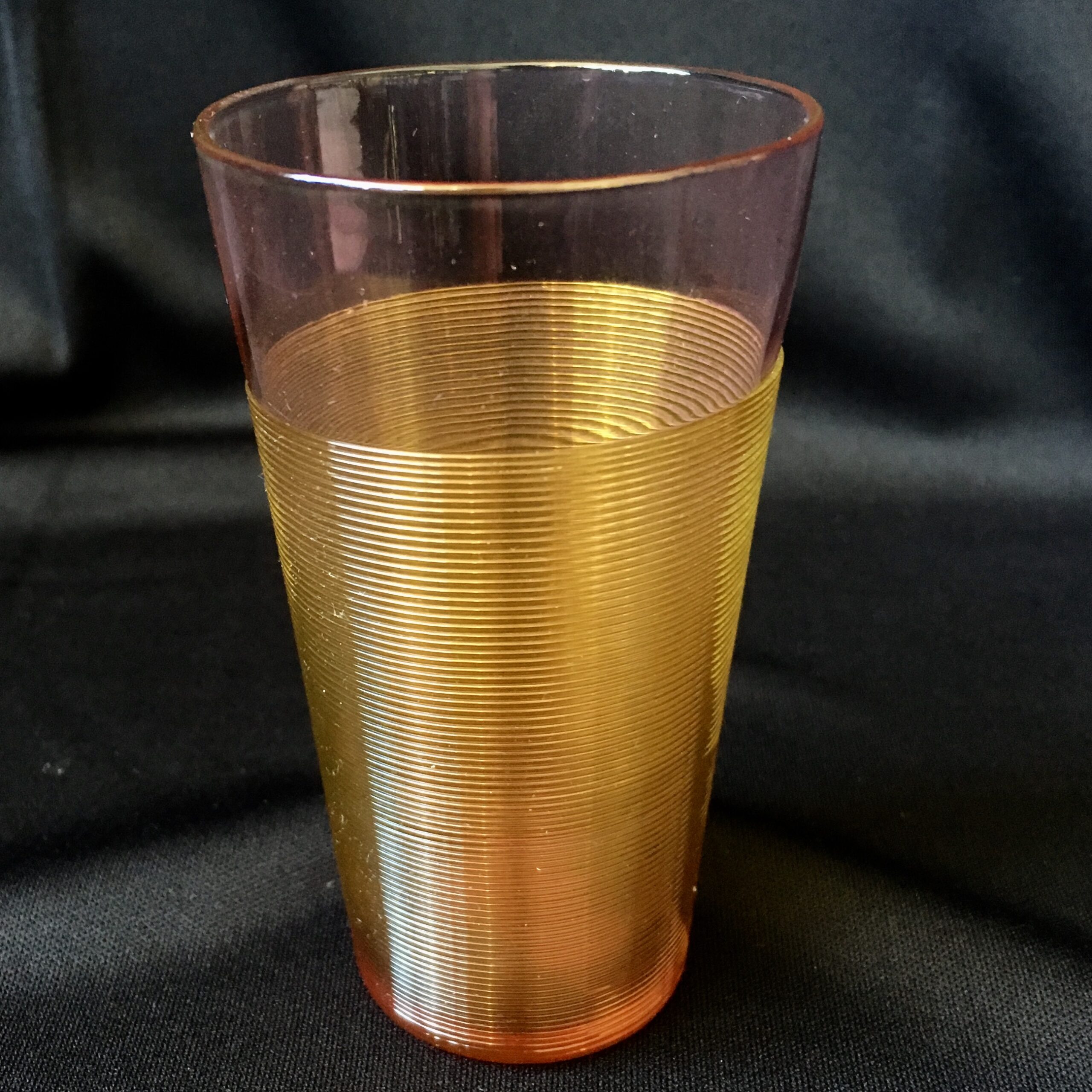 Victorian ruby glass champagne tumbler, amber trail, c.1880-0