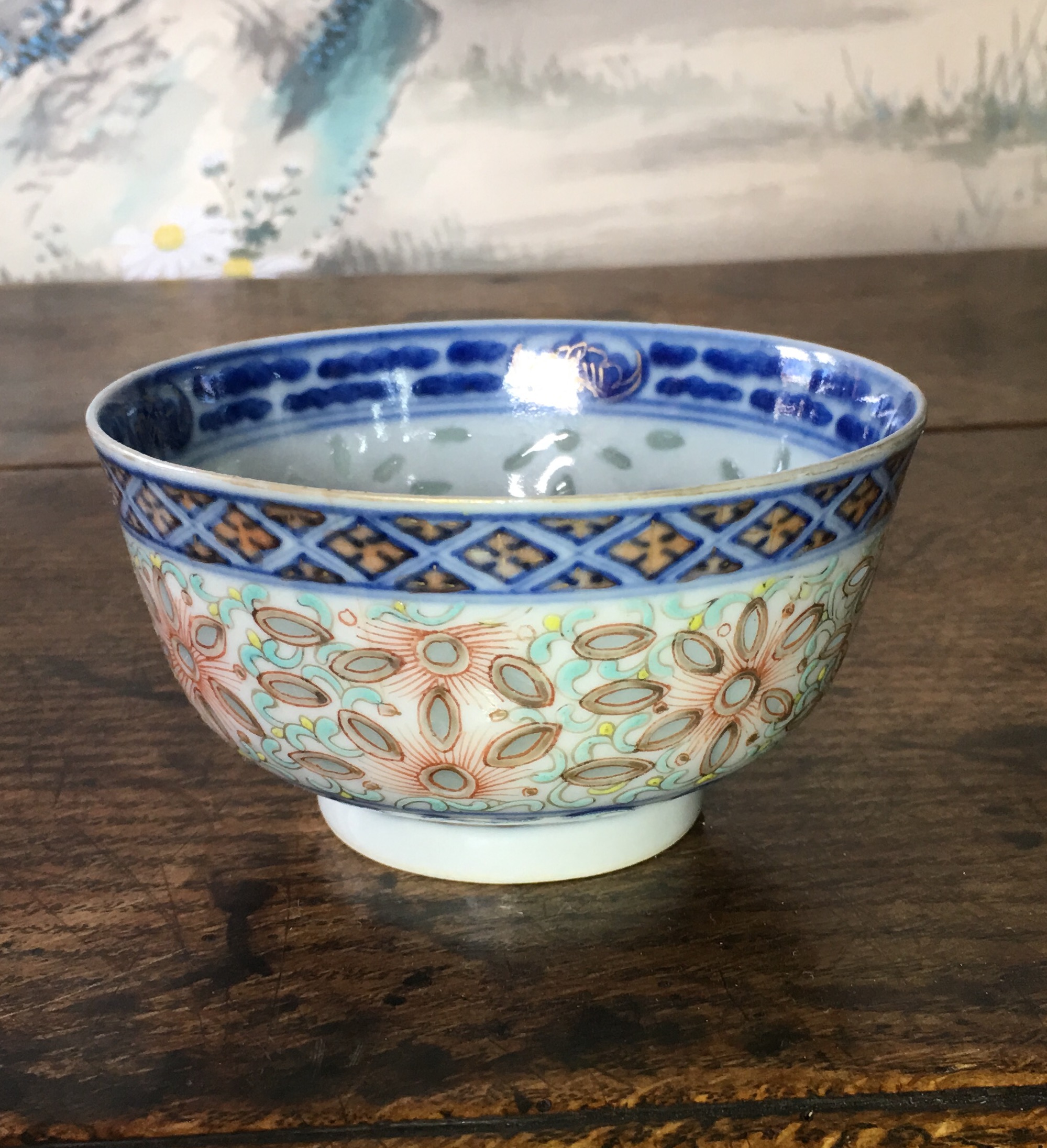 Japanese bowl with 'ricegrain' pierced sides, shishi & flowers, 19th century-0