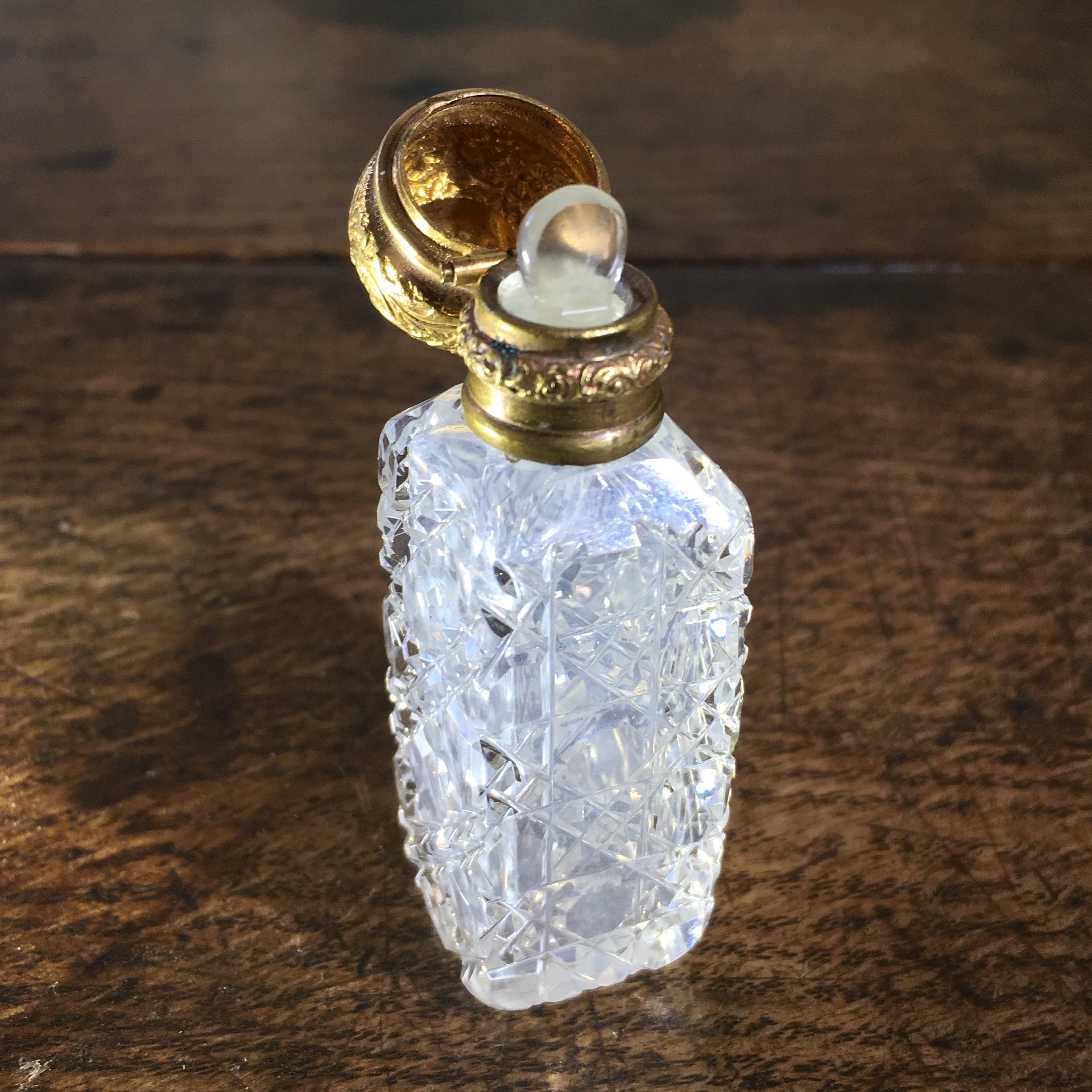 Square cut crystal perfume bottle, gilt metal lid, c. 1890-0