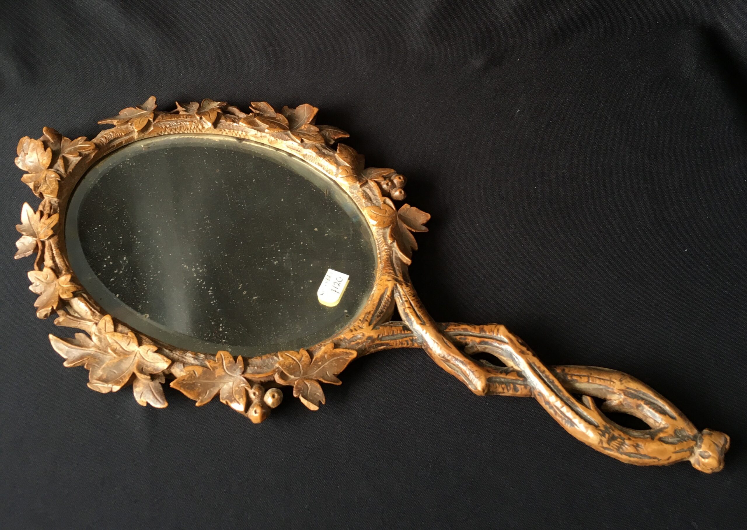 Carved Black Forrest hand mirror, 'fruiting vine' c. 1885-0