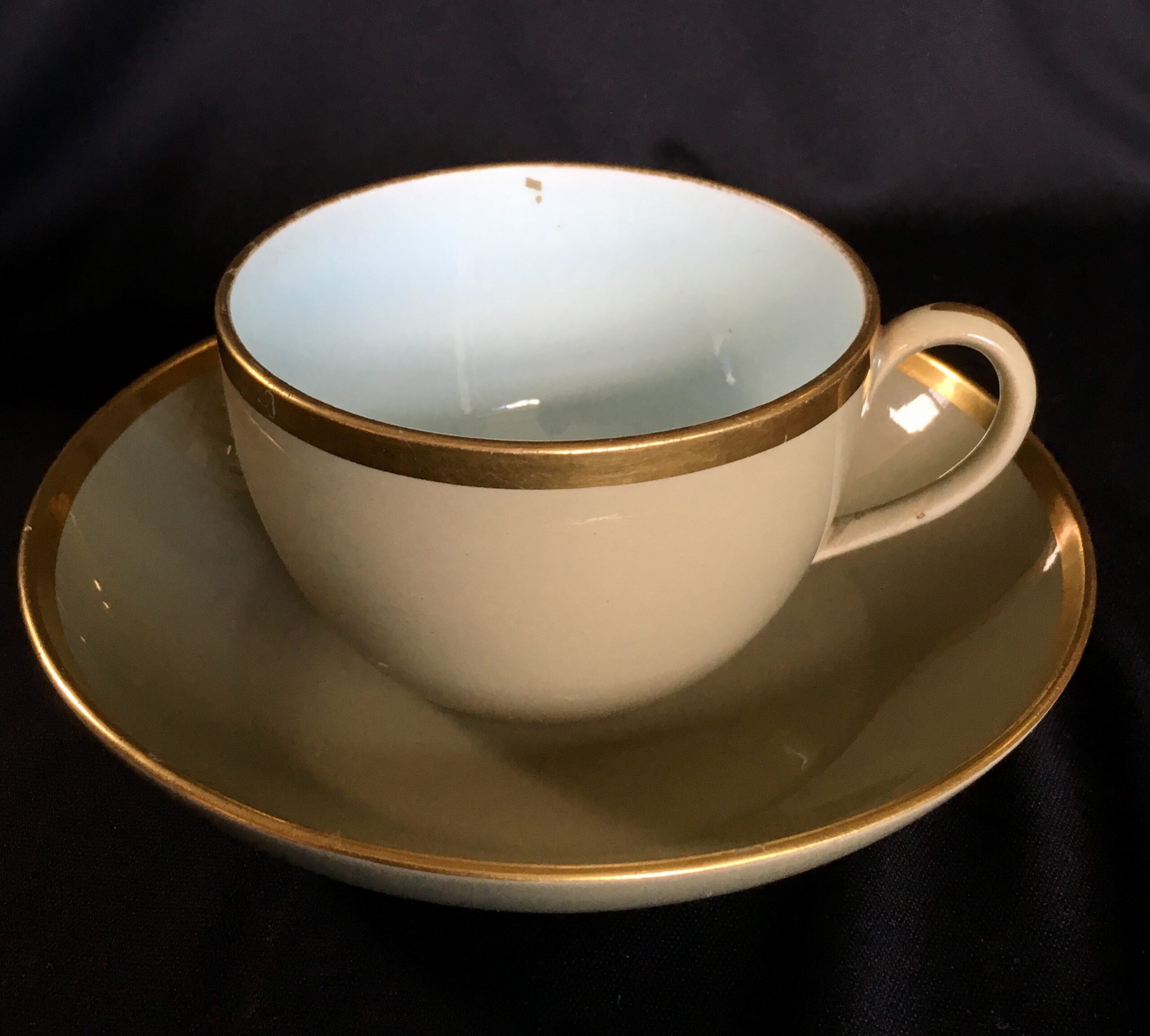 Wedgwood cup & saucer, blue interior with gilt rims, c. 1820 -0