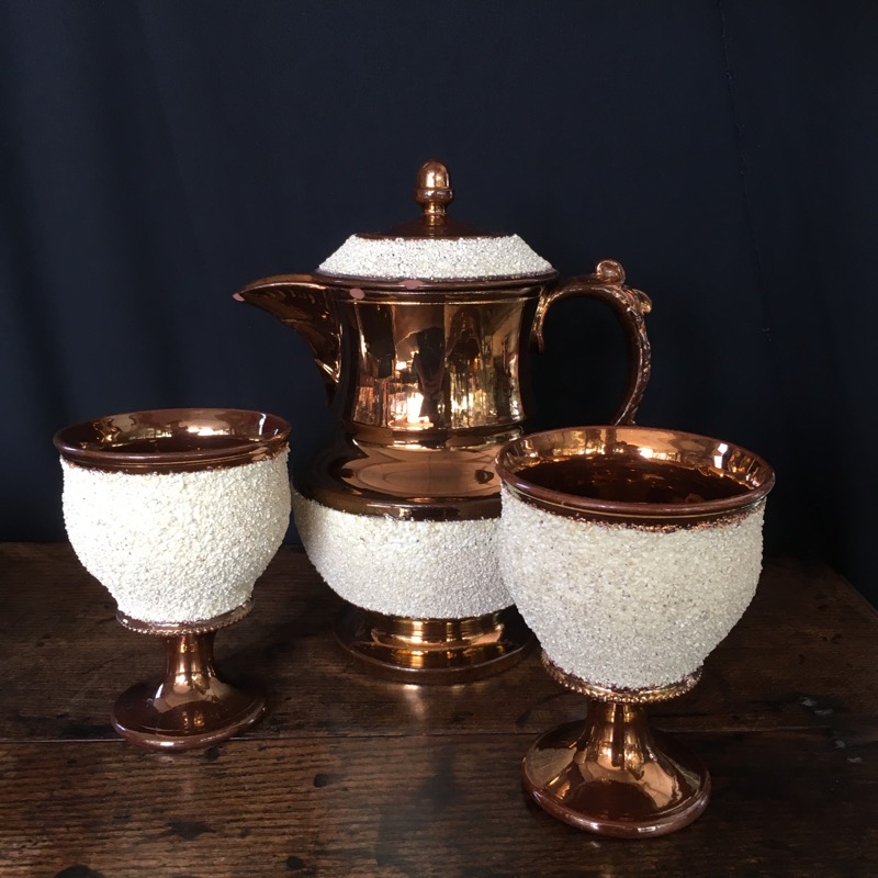 Pottery lustre covered jug & two goblets, c. 1890-0