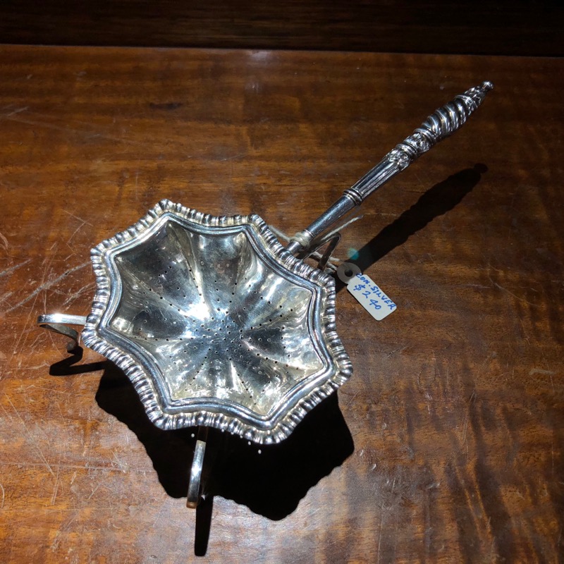 Continental silver tea strainer with legs, c. 1890 -0