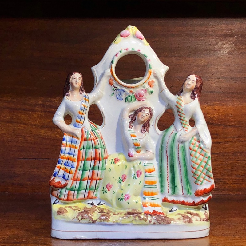 Staffordshire figural pocketwatch holder, three dancers, c. 1865-0