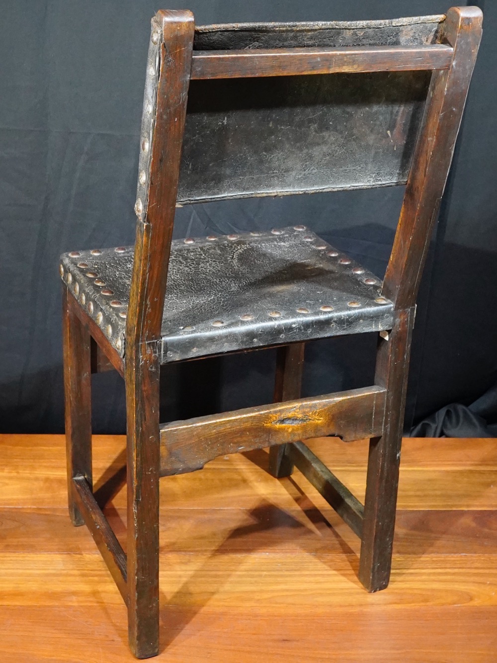 Spanish elm chair, tooled leather seat, 17th century