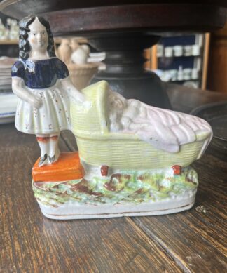 Staffordshire Child & baby in cradle,  c.1845