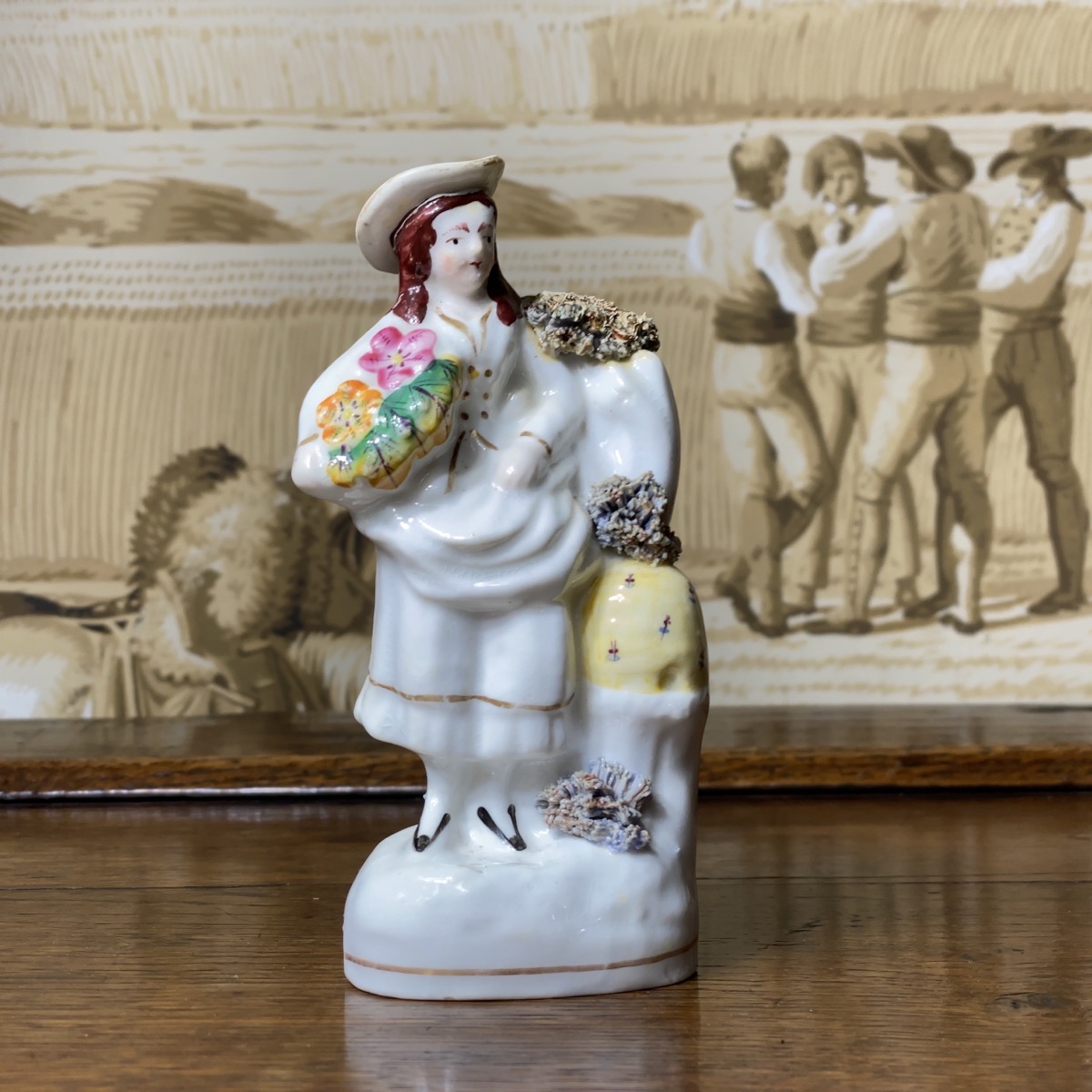 Staffordshire porcelain figure, girl with beehive & flowerbasket, c.1840