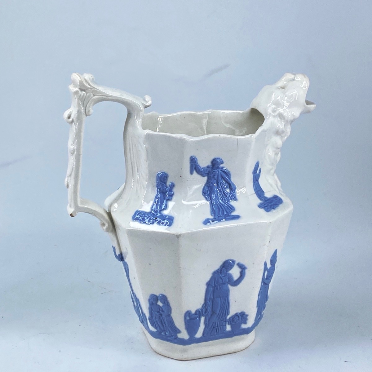 English porcelain jug, blue sprigged classical figures, lions head spout, Alcock? c. 1825