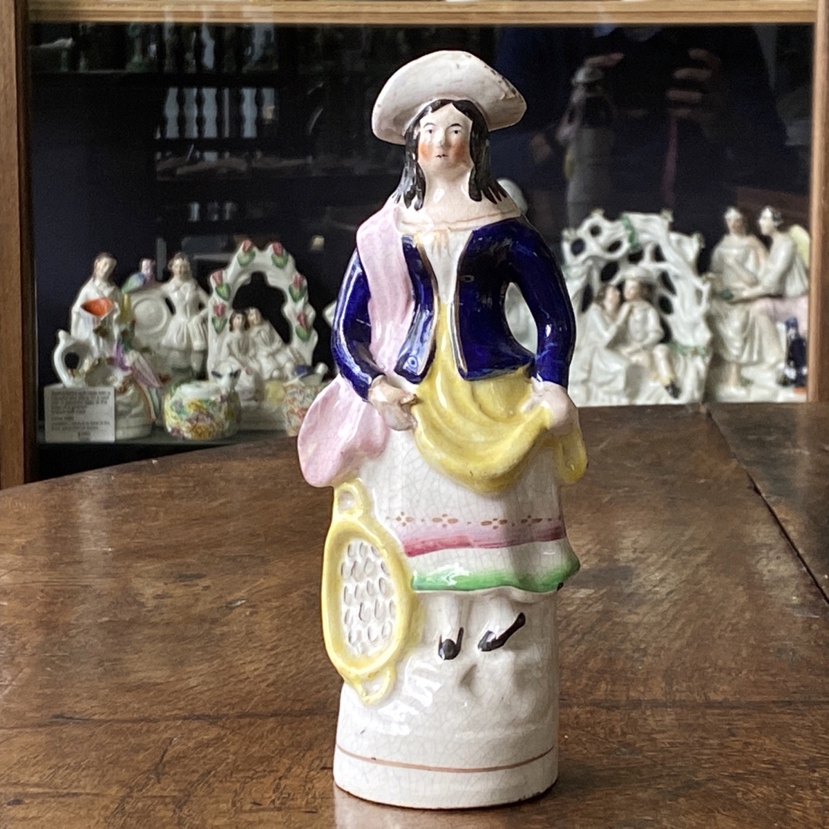 Staffordshire figure of an egg-seller, c.1850