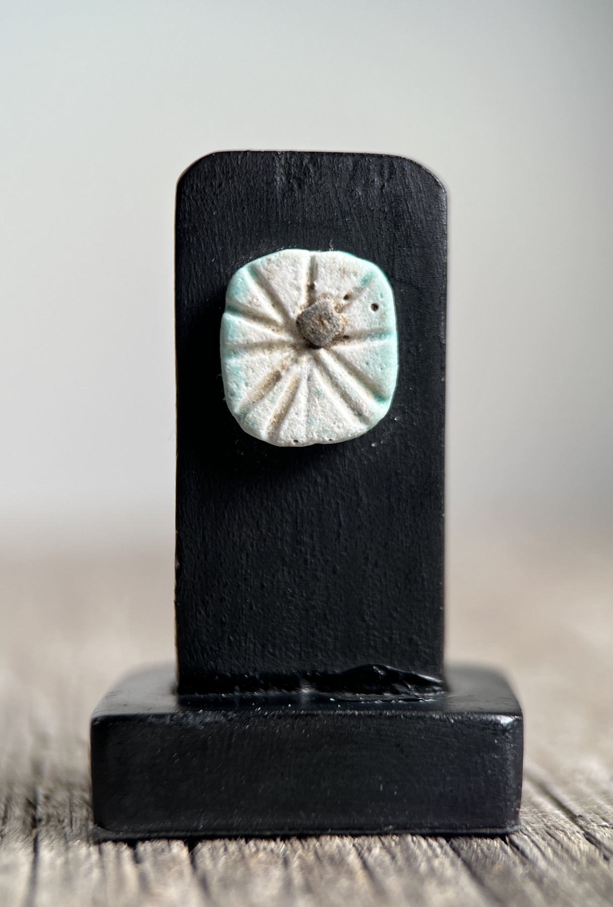 Ancient Egyptian faience amulet bead, Eye or Star, 700-300 BC