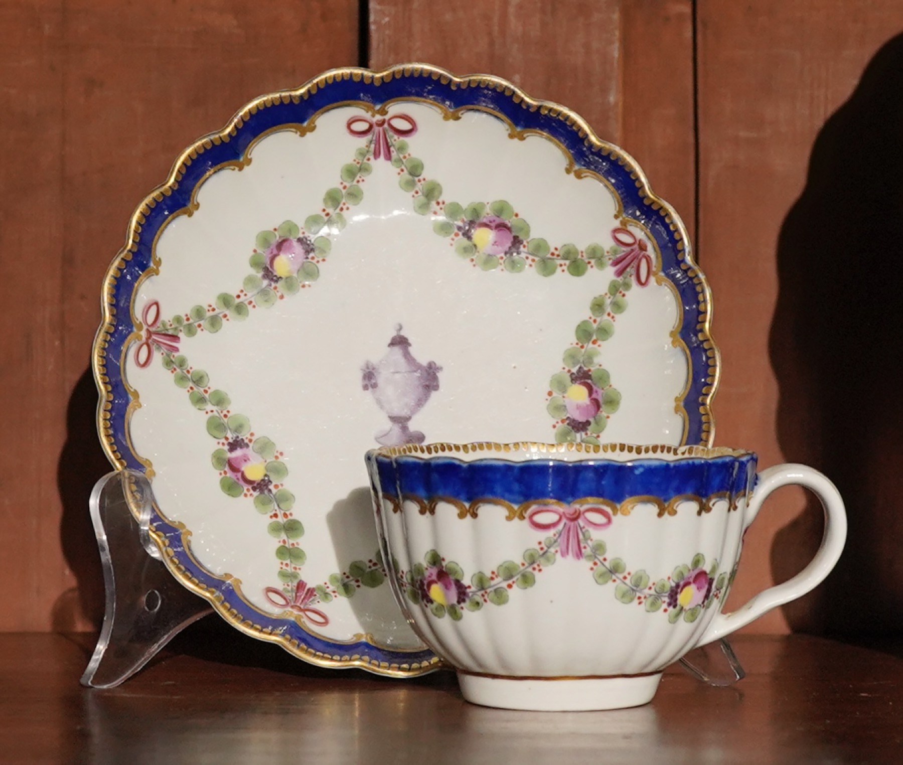 Worcester cup & saucer, swags of flowers & urn, c. 1770