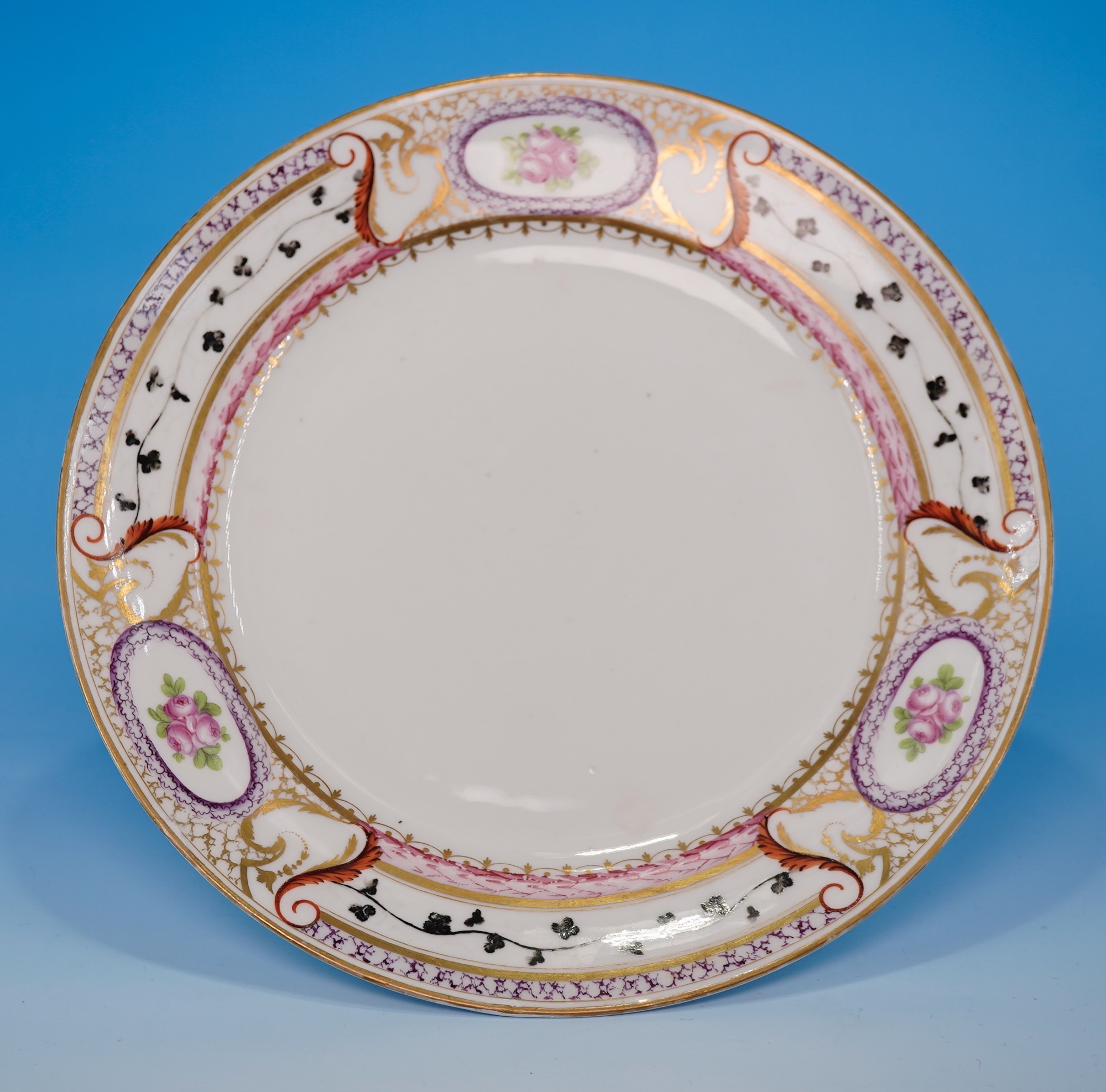 French porcelain plate by Potter, Paris with empire style gilding and rose bouquets, c.1795