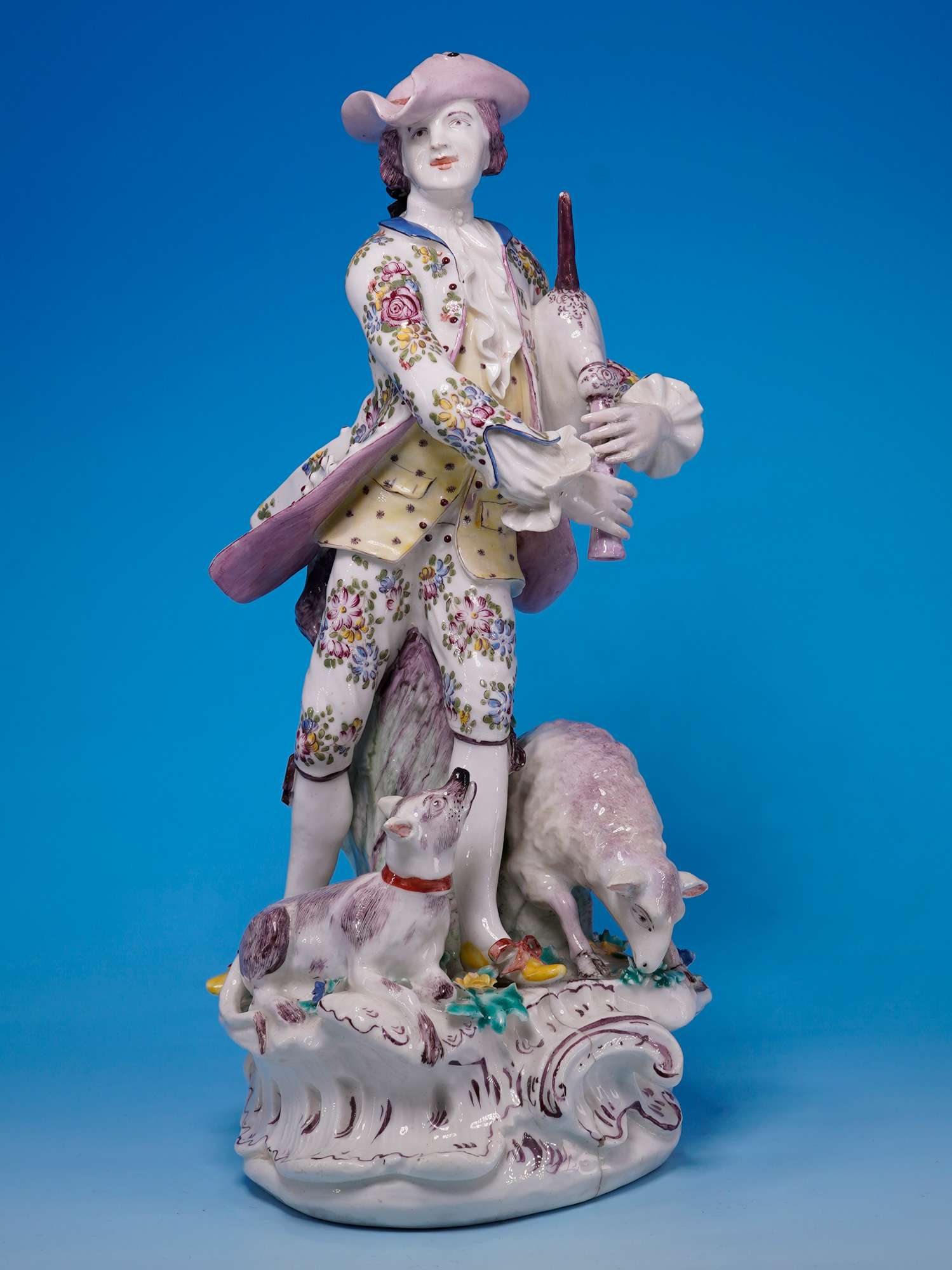 Rare large Bow figure of a shepherd with bagpipes, after Meissen, c. 1755