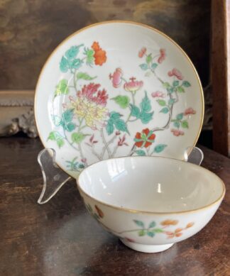 Chinese export tea bowl and saucer with polychrome peony garden, c.18thc