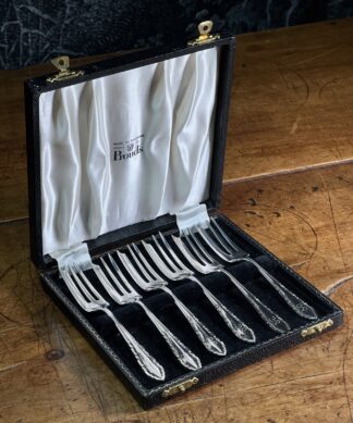 6 Sterling Silver cake forks in original Prouds Jewellers box, dated 1956.