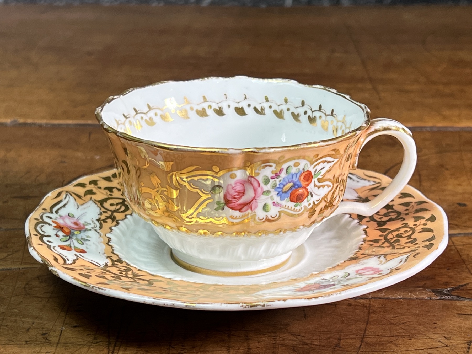 Coalport Cup & Saucer with finely painted flowers & 'hockey stick' moulding, circa 1830