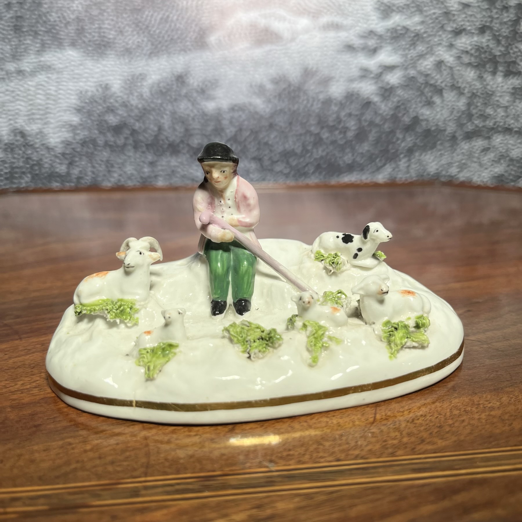 Staffordshire porcelain group of shepherd & sheep, c.1825