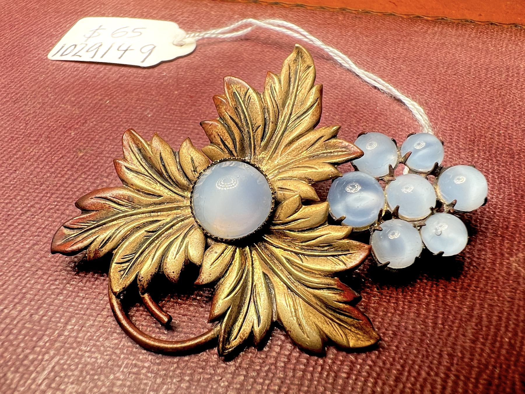 Grapevine brooch with gilt leaves and faux moonstones, C 1920