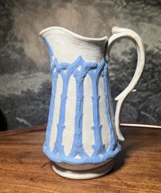 Smear glaze jug sprigged in blues C.1835