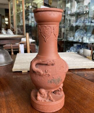 Japanese terracotta vase, supported by children, dragons, c. 1900