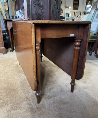 Victorian faded mahogany dropside table, c. 1845