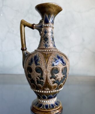 Doulton Lambeth ewer with intricate incised and beaded decoration, dated 1882