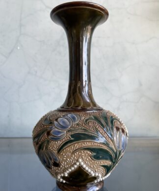 Doulton Lambeth vase with stylised tulips on intricate incised and beaded ground, Circa 1885